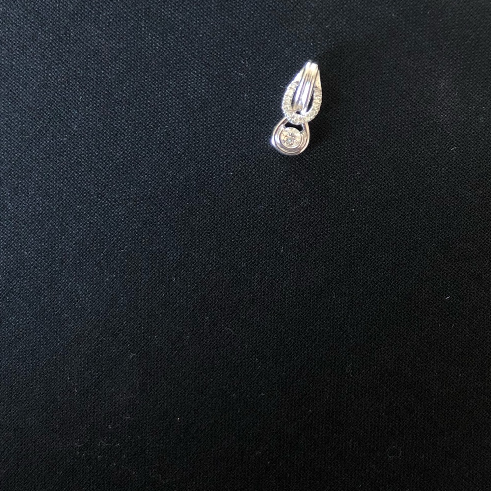 Diamond accent knot pendant
